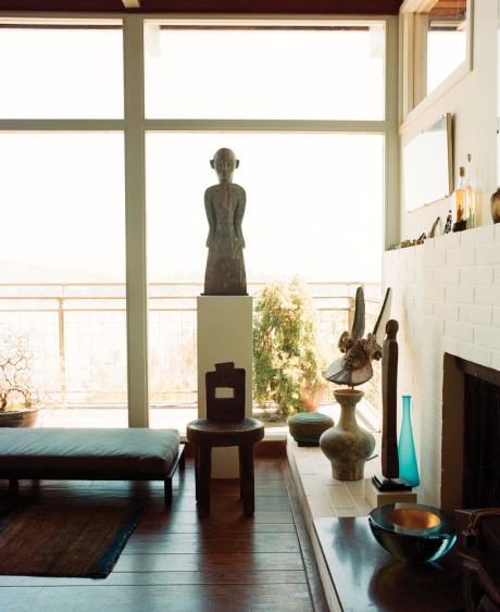 4 A carving from Borneo is silhouetted in Schwarcz’s living room overlooking the bay in Sausalito.